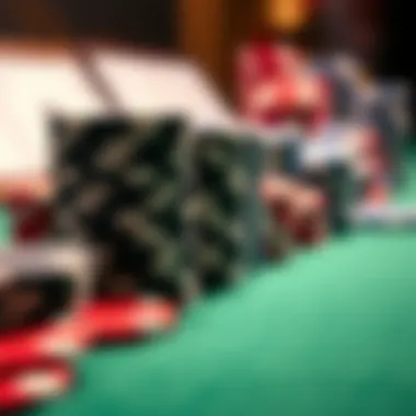 A close-up view of poker chips stacked on a green felt table